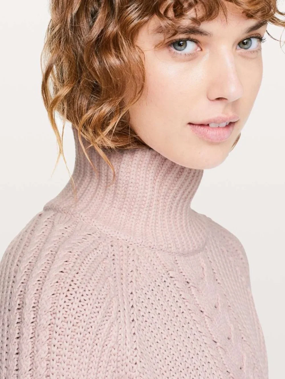 Lululemon Bring The Cozy Turtleneck in a soft misty pink cable knit